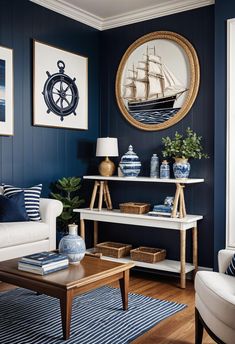 a living room with blue walls and white furniture, including a coffee table in the center