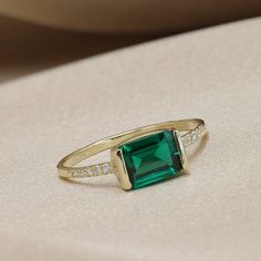 "Handmade by an inspired jewelry artist team with decades of experience in the craft of jewelry making. Each gemstone, each diamond is carefully picked. Using only the finest raw materials and the highest industry standard in manufacturing, design and finish. A beautiful vintage inspired piece handmade just for you. Set with a 8x6 Chatham emerald, octagon cut 1.45 ctw and 10 super sparkly white Diamonds 1.25 mm, 0.12ctw. Perfect for stacking, wearing with your other diamond or emerald rings or w Fine Jewelry Baguette Cut Birthstone Promise Ring, Diamond Baguette Cut Birthstone Ring, Emerald Cut Yellow Gold Crystal Ring, Fine Jewelry Promise Birthstone Ring In Baguette Cut, Fine Jewelry Emerald Crystal Ring With Accent Stones, Diamond Ring With Rectangular Gemstone, Emerald Cut Gemstone Stackable Rings In 14k Gold, Promise Ring With Baguette Cut Gemstone, Dainty Emerald Rings With Emerald Cut