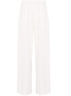 white crepe texture ruched detailing dart detailing to the rear mid-rise wide leg two side inset pockets elasticated waistband straight hem unlined