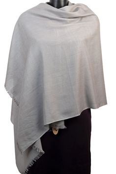 We are pleased to present a brand new range of ethically produced scarves and shawls made from a very soft fully certified organic cotton yarn. This silver pashmina shawl is the prefect summer scarf or bridal wrap. If you are looking for a gift for a women with an ethical conscience what could be better than this fair trade gray scarf? These large grey shawls are perfect as an evening shawl or just as useful as a smart pashmina or travel scarf. Material: 100% organic cotton Size: 180 x 70cm Weig Wedding Pashmina, Grey Shawl, Cotton Shawl, Wedding Shawls, Evening Shawls, Summer Shawl, Bridal Cover Up, Travel Scarf, Summer Scarf