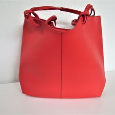 Neiman Marcus Women's Large Red Tangerine Vegan Leather Tote Handbag. Nwot. Approx. Measurement Details: H10" W5" L17" Strap Drop L: 13.5" Tan Bucket Bag With Detachable Strap For Shopping, Tan Bucket Shoulder Bag With Adjustable Strap, Red Spring Bags, Red Leather Bucket Bag With Detachable Handle, Red Leather Top Handle Bucket Bag, Shopping Satchel With Adjustable Strap In Tan, Tan Satchel With Adjustable Strap For Shopping, Red Shoulder Bag For Shopping, Tan Bucket Bag For Errands