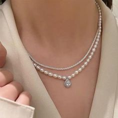 Material: genuine freshwater pearl,S925 sterling silver with Rhodium plated connector, alloy with gold plated pendantLuster: highPearl size:4-5Blemish: few blemishLength: 42cm (16.5 inches)The silver necklace in the picture:https://www.etsy.com/listing/1038541031/solid-sterling-silver-necklace-925?ref=shop_home_active_1&pro=1&frs=1DISCOUNTS ON LARGE ORDERSGet 10% off for order $50-$99Get 15% off for order $99-$199Get 20% off for order $200-$399Get 25%off for order $400 and more Silver Pearl Charm Necklace With Pearl Chain, Elegant Pearl Pendant Charm Choker, Elegant Pearl Pendant Charm Necklace Choker, Elegant Pearl Pendant Choker Necklace, Elegant White Charm Necklace Choker, Elegant White Charm Choker Necklace, Silver Pearl Drop Choker Necklace, Silver Pearl Drop Necklace In Choker Style, Silver Pearl Charm Necklace With Pearl Pendant