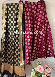 Soft and flowy Banarsi satin silk lehenga/skirt with a big flare and a coordinating Banarsi dupatta. Skirt length: 40 inches. Skirt waist: fits up to 38 inches. Dupatta: 96 by 34 inches. Color: Black and Wine Traditional Anarkali Satin Dupatta, Anarkali Satin Dupatta, Designer Anarkali Skirt With Zari Work, Designer Wear Traditional Drape Skirt For Navratri, Bollywood Style Katan Silk Sharara With Dabka, Bollywood Style Silk Party Skirt, Designer Traditional Drape Skirt With Zari Work, Designer Zari Work Dupatta For Long Skirt, Designer Long Skirt Dupatta With Zari Work