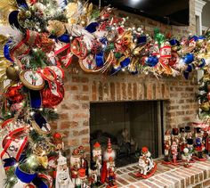 a fireplace decorated with christmas decorations and ornaments