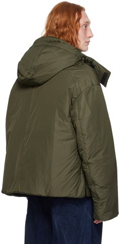 Insulated nylon ripstop jacket. · Bungee-style drawstring at detachable hood · Funnel neck · Two-way zip closure · Welt pockets · Concealed bungee-style drawstring at hem and cuffs · Zip vent at side seams · Welt pocket at interior · Full polyester satin lining Supplier color: Khaki Functional Nylon Parka With Zipper Closure, Nylon Parka With Zipper Closure For Cold Weather, Nylon Parka With Zipper Closure For Outdoor, Utility Nylon Hooded Jacket With Double-lined Hood, Urban Down Parka With Detachable Hood, Hooded Nylon Parka With Drawstring, Nylon Hooded Parka With Drawstring, Urban Nylon Parka For Cold Weather, Functional Nylon Utility Jacket With Drawstring Hood