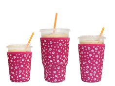 three cups with straws in them sitting next to each other