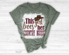 This Girl Loves Her Country Music Bleached Shirt Introducing the "This Girl Loves Her Country Music" Bleached Shirt – a perfect blend of style and comfort for true country music enthusiasts. Embrace the softness and ease of our shirt, crafted for both men and women in sizes Small through 2X, ensuring a perfect fit for every fan. Choose from a variety of shirt colors to match your personal style. Key Features: Soft Style Feel: Immerse yourself in the luxurious softness of our bleached shirt, designed for ultimate comfort. Light and Comfortable: Enjoy the lightweight feel of this shirt, perfect for all-day wear without sacrificing style. Unisex Fit: Tailored for both men and women, our shirt offers a versatile fit for every country music lover. Size Inclusivity: Available in sizes Small thro Country Bleached Shirts, Country Music Shirts Shania, Country Singers Shirt, Country Tshirts Country Girl, Deep Love, Music Lovers, Bleach, Country Music