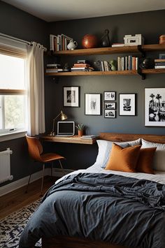 a bed sitting in a bedroom next to a window with pictures on the wall above it