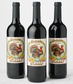 three bottles of gobble wine on a white table with an image of a turkey