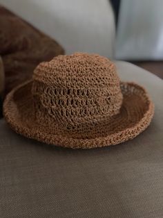 Raffia sun hat. Hand crocheted. Packable. Crushable. Stretches to fit perfectly. Casual Beach Crochet Hat One Size, Casual Lightweight Crochet Hat In Brown, Casual One Size Crochet Hat For Beach, Casual Lightweight Brown Crochet Hat, Casual Crochet Straw Hat, One-size Crochet Hat For Beach In Spring, One Size Crochet Hat For Beach In Spring, Lightweight Crochet Fedora Hat For Warm Weather, Casual Brimmed Crochet Hat For Warm Weather