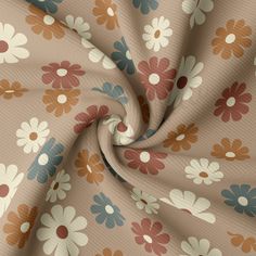 an image of a flowery fabric with many flowers on it's side and the center