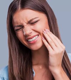 Banish toothaches fast! 18 home remedies for quick relief.  Say goodbye to pain with these simple solutions. #toothache #homeremedies #teeth #painrelief #naturalremedies