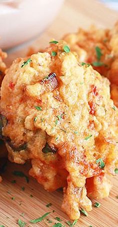 some fried food on a wooden cutting board