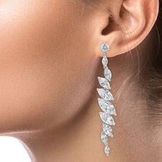 5 CTTW Marquise Cubic Zirconia linear drop earrings. Set in Rhodium or Gold plated brass. Pierced ear.  2.75"L X .5"W Style #: CZ-KE1735_CL Pierced Ear, Earrings Set, Ear Piercings, Cubic Zirconia, 404 Not Found, Gold Plate, Plating, Not Found, Drop Earrings