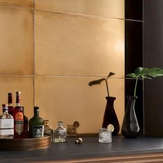 an assortment of liquor bottles on a counter