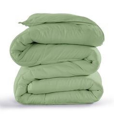 three pillows stacked on top of each other