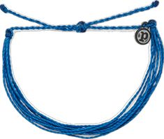 Pura Vida Bright Solid Bracelet in Royal Blue  It’s the bracelet that started it all. Each one is handmade, waterproof and totally unique—in fact, the more you wear it, the cooler it looks. Grab yours today to feel the Pura Vida vibes.  Brand: Pura Vida Material: Wax-Coated Size & Fit: Adjustable from 2-5 Inches in Diameter Royal Blue, Blue