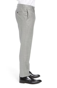 A tapered-leg cut shapes modern-classic trousers fashioned from finely textured wool. Style Name:Ted Baker London Jefferson Flat Front Wool Dress Pants. Style Number: 519066. Tapered Leg Pants With Hidden Button Closure For Work, Tailored Suits With Belt Loops For Formal Occasions, Tailored Formal Suits With Belt Loops, Tailored Timeless Formal Pants, Wool Suits With Straight Pants For Formal Occasions, Tapered Leg Bottoms With Hidden Button Closure For Work, Timeless Straight Dress Pants For Formal Occasions, Modern Business Dress Pants, Timeless Business Dress Pants With Welt Pockets