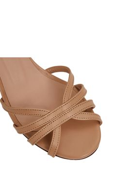 Intersecting vamp straps lend contemporary dimension to a leather sandal set on a cushioned footbed and chunky block heel. 2 1/4" heel Adjustable ankle strap with buckle closure Cushioned footbed Leather upper, lining and sole Made in Italy Modern Beige Low Heel Sandals, Beige Leather Open Toe Block Heels, Leather Low Heel Wedge Sandals With Wrapped Heel, Beige Leather Block Heels With Heel Strap, Beige Sandals With Reinforced Heel And Medium Width, Beige Sandals With Stacked Low Heel, Beige Leather Wedge Sandals With Padded Heel, Leather Open Toe Block Heels With Reinforced Heel, Leather Wedge Sandals With Heel Strap And Block Heel