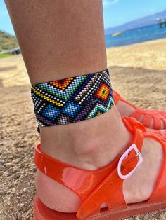 Native American Aztec Desing Anklets Boho style, Aztec design inspired from Native American pattern anklets just  perfect for summer. If you enjoy wearing bohemian style pieces and patterns this piece will make you feel very happy while wearing.  It is carefully handcrafted with the finest Miyuki beads, very comfortable to wear, made with extreme patience and care to have the perfect finish so at the end the product is high quality handmade jewellery. As the pattern is so detailed, making one pa Hippie Ankle Wrap Anklets For Festival, Bohemian Festival Anklets With Ankle Strap, Bohemian Ankle Strap Anklets For Festivals, Bohemian Festival Anklets, Hippie Beaded Ankle Wrap Anklets, Bohemian Ankle Wrap Bracelets For Festivals, Traditional Summer Beach Anklets, Handmade Ankle Wrap Bracelets For Festival, Hippie Ankle Wrap Anklets For Summer