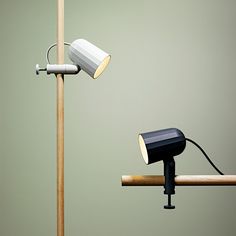 an image of a lamp on the side of a pole