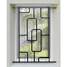 an image of a window with black bars on it's sides and purple flowers in the background