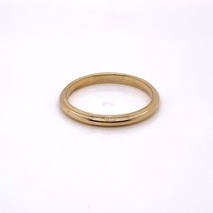 Vintage 1940's 14k yellow gold plain ridge band with Jabel trademark. The band is a size 7. The width of the band is 2.3mm. The height of the ring off the finger is 1.5mm. Classic 14k Gold Round Wedding Ring, Classic Jewelry With Smooth Rounded Bezel, Classic Yellow Gold Rounded Rings, 14k Yellow Gold Dome Ring, Classic Engraved Ring With Thick Band And Polished Finish, Classic Engraved Ring With Polished Finish, Classic Thick Band Jewelry With Polished Edges, Classic Engraved Thick Band Ring With Polished Finish, Classic Jewelry With Polished Edges And Thick Band