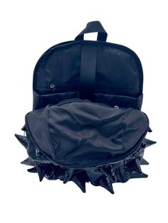 Black Out black backpack is your ticket to making an unforgettable statement. This black backpack's bold spike design and faux reptile texture commands attention and exudes confidence that sets you apart from the crowd. EXTERIOR Dimensions: 18" x 14" x 8" • Two zipper side pockets • Ergonomic mesh extra back padding • Adjustable Straps with chest strap for custom sizing • Heavy duty zippers with metal hardware • Top loop for hanging INTERIOR Padded laptop compartment protects electronics • Fits Tiny Bags, Reptile Skin, Chest Strap, Medium Backpack, Bag Clips, Metallic Bag, Large Backpack, Black Bag, Kids Backpacks