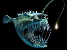 a fish with its mouth open and it's teeth wide open, while the light is