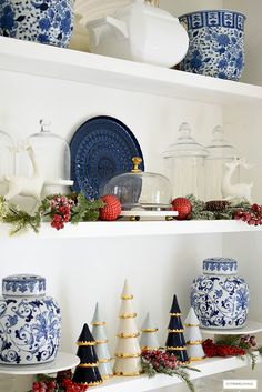 blue and white christmas decorations on shelves