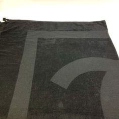 a black bag with a white and gray design on it