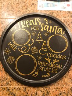 there is a sign on the wall that says please for santa and cookies reindeer snacks