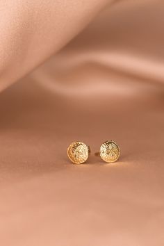 Once you put on these sand dollar studs, you will never want to take them off! The Kyra studs are dainty, and beautifully detailed to create sand dollar imprints. The perfect beachy stud going into summer, these studs are golden minimalist classics that are perfect for any ear stack! -24K Gold Filled studs -Sold as a pair Beach Earrings, Ear Stack, Sand Dollar, Earrings Studs, Stud Earring, A P, Put On, Gold Filled, Stud Earrings