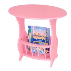 a pink table with books on it and a magazine rack in the middle for children to read