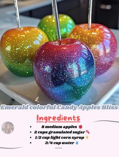 three colorful candy apples sitting on top of a white plate