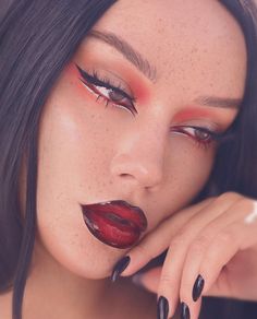 Eyeshadow Looks Red And Black, Black Red And White Makeup, Red And Black Makeup Full Face, Eye And Lip Makeup Combo, Red White And Black Makeup Looks, Black And Red Lip Combo Makeup Look, Black And Red Makeup Ideas, Black Lined Red Lips, Red Black Lip Combo