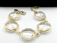 "Vintage gold tone and crystal link bracelet, In very good condition. It's 7' 12/ long Extend 2\" long. 7/8\" wide. Weighs 1 Oz. Thanks." Gold Crystal Bracelet Costume Jewelry, Gold Faceted Crystal Bracelet, Gold Crystal Costume Bracelet, Gold Crystal Bracelet With Faceted Details, Swarovski Brooch, Sterling Silver Marcasite, Moon Stone, Chain Link Bracelet, Vintage Signs