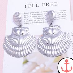 Big Metal Shell Earrings: Perfect for the Passionate Sea Lover Introducing our stunning Big Metal Shell Earrings, the perfect accessory for anyone who has a deep love for the sea and its enchanting symbols. These earrings are part of our popular Shell Earrings collection, where you can find a wide variety of nautical-themed earrings that will make you feel like you're always close to the ocean. Whether you're attending a beachside party or simply want to add a touch of the sea to your everyday s Sea Lover, Wedding Party Jewelry, Earring For Women, Deep Love, Shell Earrings, Women Cargos, Earring Jewelry, Girls Earrings, Cargo Pants Women