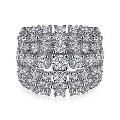 an 18k white gold diamond ring set with four rows of round brilliant cut diamonds