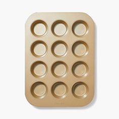 a muffin tray with nine holes in it