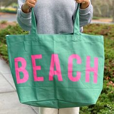 This Well Made Beach Canvas Tote is a stylish and functional eco bag for any outing. Crafted with high quality, heavy duty canvas fabric, it features two large pockets - one for a water bottle and another for small items - and an oversized capacity to fit all of your essentials. Its eye-catching color contrasting design adds a chic, beach-ready look.Crafted with 16 oz canvas fabric, nicely structured heavy duty canvas fabric, One side printingDimensions: approximately 17.5" x 7" x 16", strap per Jewelry Roll, Beach Canvas, Beach Adventure, Rick Rack, Beach Ready, Beach Chic, Activewear Sets, Eco Bag, Yoga Tops