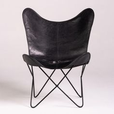 With an iconic design history that dates back to the 1940s, the Butterfly Chair is an alluring accent. 

Flaunting a signature silhouette, the Butterfly Accent Chair was first launched in 1940 by a team of three Argentine architects who became inspired by a folding chair used in the Military known as the ‘Tripolina’. Butterfly Chairs, Leather Butterfly Chair, Comfortable Accent Chairs, Butterfly Chair, Buffalo Leather, Black Metal Frame