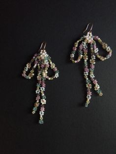 This is bow earrings made of seed beads, pearls and glass beads. They are neatly handwoven in feminine design. the all materials that I use are of the high quality (natural stones or first grade beads)  all pieces in my store are neatly handcrafted by me  ready to ship for 1-3 days worldwide free shipping (delivery time US -10-20 days, Europe 14-24days, other 14-30days)  I represent a small business and items are limited I use cute handmade eco tags made from recycled paper in the packaging, i Jewelry Y2k, Earrings Bead, Gold Hooks, Pearl Bow, Women Aesthetic, Paper Earrings, Dope Jewelry, Beaded Drop Earrings, Handmade Beaded Jewelry