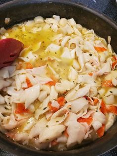 the food is being prepared in the pan