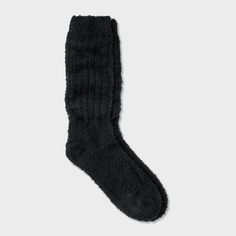 Keep your feet warm with the Women’s Cozy Slouch Crew Socks from Auden™ 4-10. These ultra plush, supremely soft socks are made from buttery soft yarns, ensure maximum comfort and warmth. Ribbed knit cuffs provide a secure fit that stays in place all day. The relaxed slouchy look is perfect for lounging at home or pairing with your favorite slippers or boots. Experience cozy, comfortable feet every day with these essential crew socks. Auden™: Fit for you in every way. Comfortable Warm Solid Color Socks, Cozy Warm Solid Color Socks, Warm Comfortable Plain Color Socks, Cozy Super Soft Socks For Fall, Warm Snug Solid Socks, Cozy Warm Socks For Cold Weather, Super Soft Solid Winter Socks, Cozy Snug Socks For Cold Weather, Super Soft Black Socks For Winter