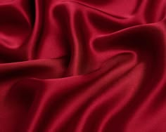 a close up view of a red fabric