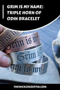 a person holding three different bracelets with the words grim is my name