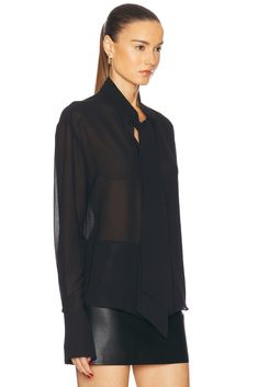 Self: 100% polyester, Trim: 92% polyester 8% spandex.  Made in China.  Hand wash.  Front button closure.  .  .  .  .  .  .  .  .  .  .  .  . Sleek Fitted Collared Top, Sleek Collared Top With Button Closure, Collared Tops With Hidden Button Closure For Office, Sleek Button-up Tops For Fall, Sleek Button-up Fall Tops, Sleek Fitted Tops With Button Closure, Sleek Fall Button-up Tops, Long Sleeve Tops With Hidden Buttons For Office, Fitted Tops For Office Wear