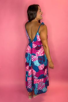 This stunning Maxi Dress is not only head turning but also so comfortable. The soft material is super lightweight so even on the hottest day you'll feel the breeze. Perfect to dress up for a vacation dinner date or dress down with some sandals for the beach Adjustable tie straps FIT: Runs big, size down. Model is a size 8, wearing a medium, but also could have worn the small. 95% Polyester, 5% Spandex Beach Sundress With Knotted Straps For Spring, Beachy Tie-back Dresses For Spring, Beachy Tie Back Dresses For Spring, Spring Beachy Dress With Tie Back, Beachy Spring Dresses With Tie Back, Beachy Spring Dresses With Tie Back Details, Pink Beachwear Dress With Adjustable Straps, Spring Beach Dress With Tie Back For Beach Party, Pink Maxi Dress With Adjustable Straps For Beach