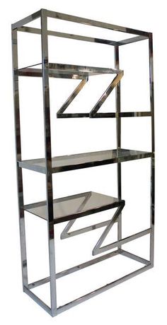 a metal shelving unit with glass shelves